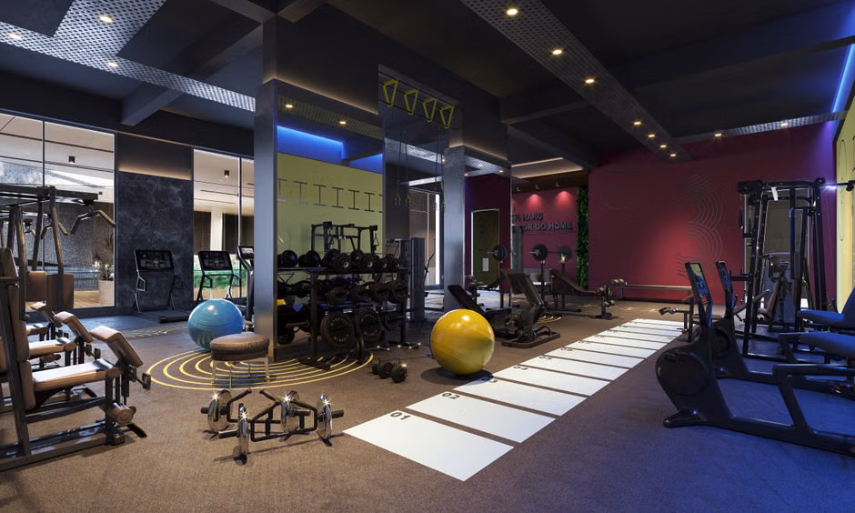 Spacious gym interior showcasing equipment for exercise and fitness training.